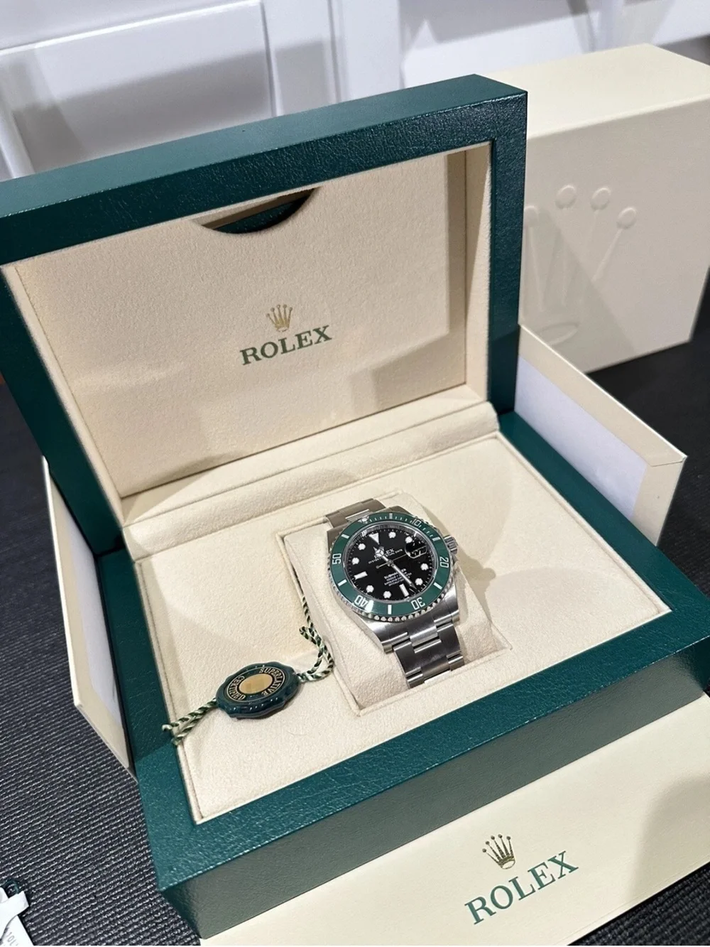 Rolex Submariner Stainless Steel Watch with Green Bezel and Black Dial